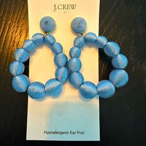 J. Crew blue, hoop earrings.